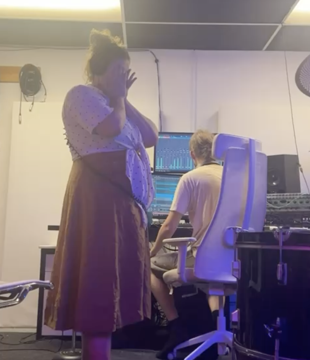 Olivia and Paul recording vocals on Firestorm In Evening