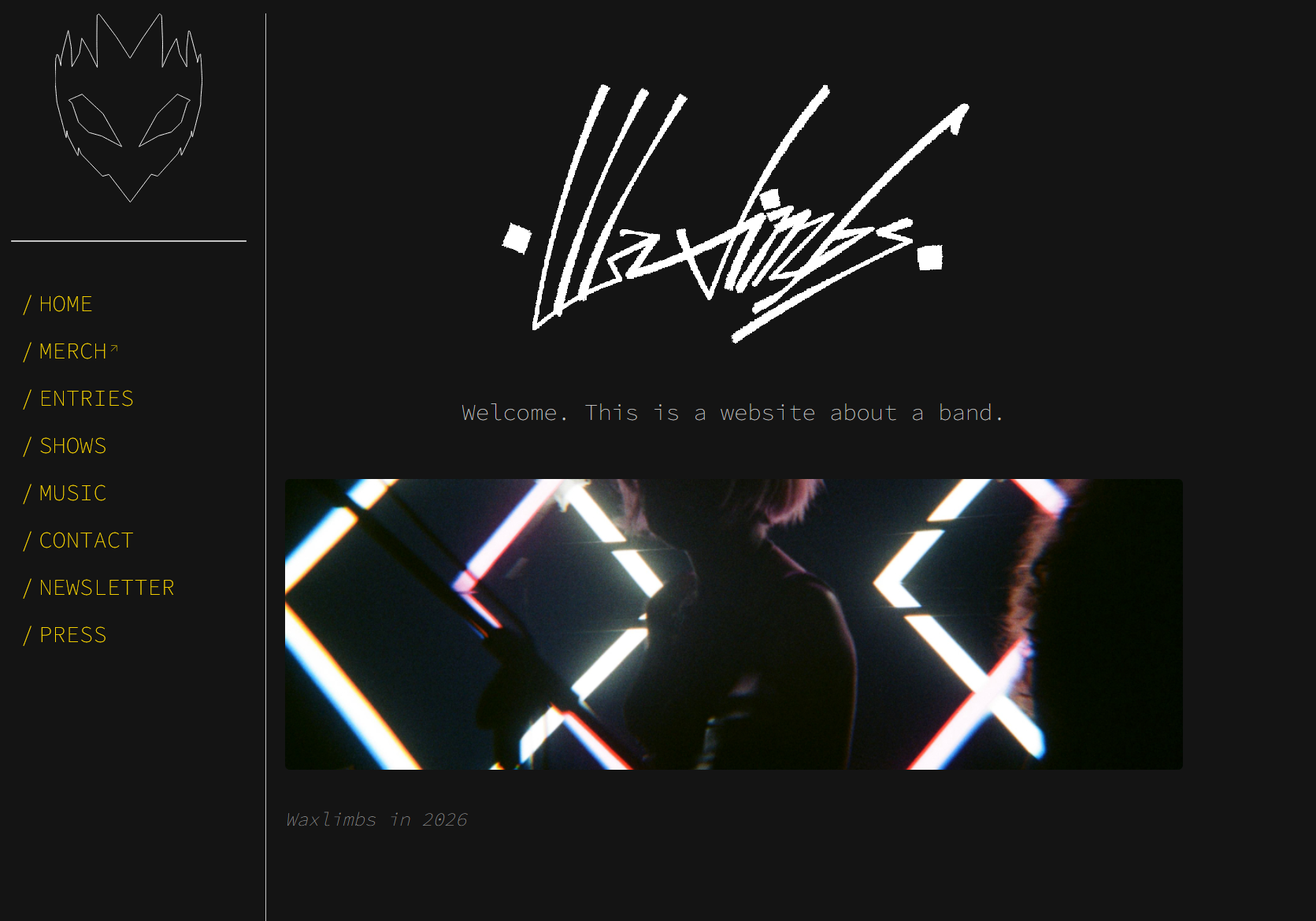 The Waxlimbs homepage, featuring a left sidebar layout with a white-and-yellow-on-grey colour scheme.